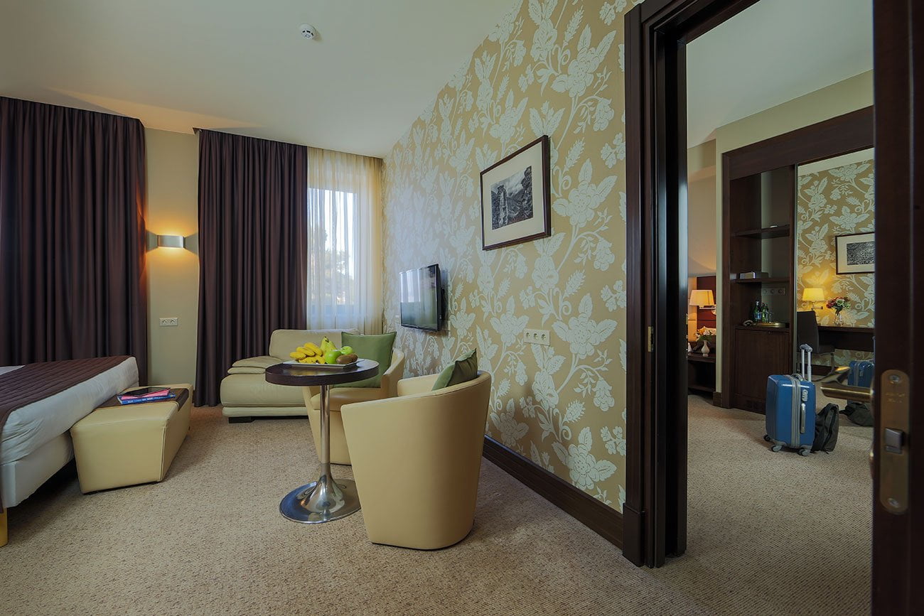 photo interior design of a two-room suite in the Vallex Garden hotel