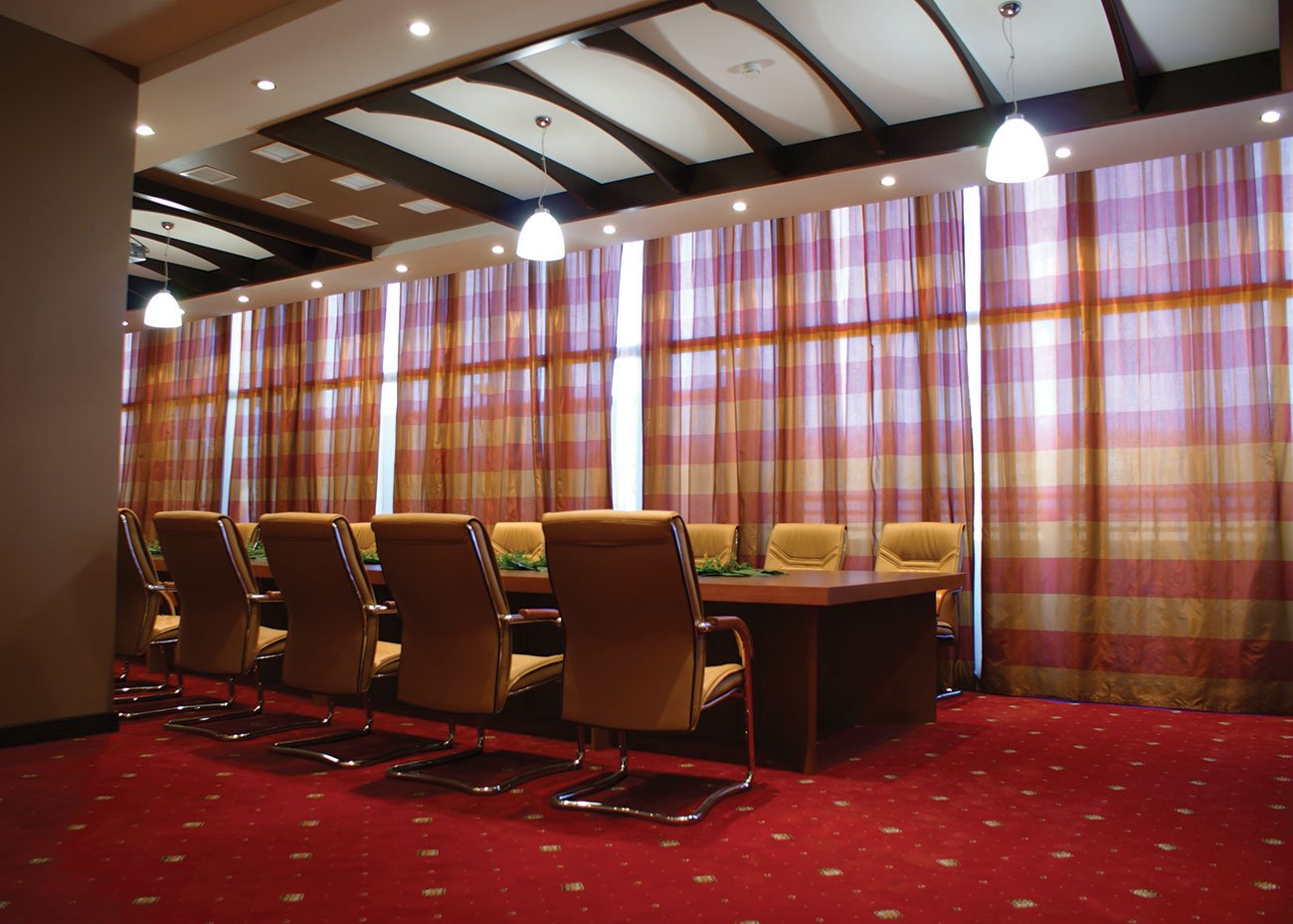 photo of the interior of the conference room designed in a modern style with ethnic elements