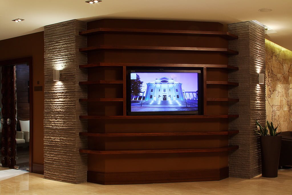 photo of a fragment of the hall with a monitor in the VALLEX GARDEN hotel