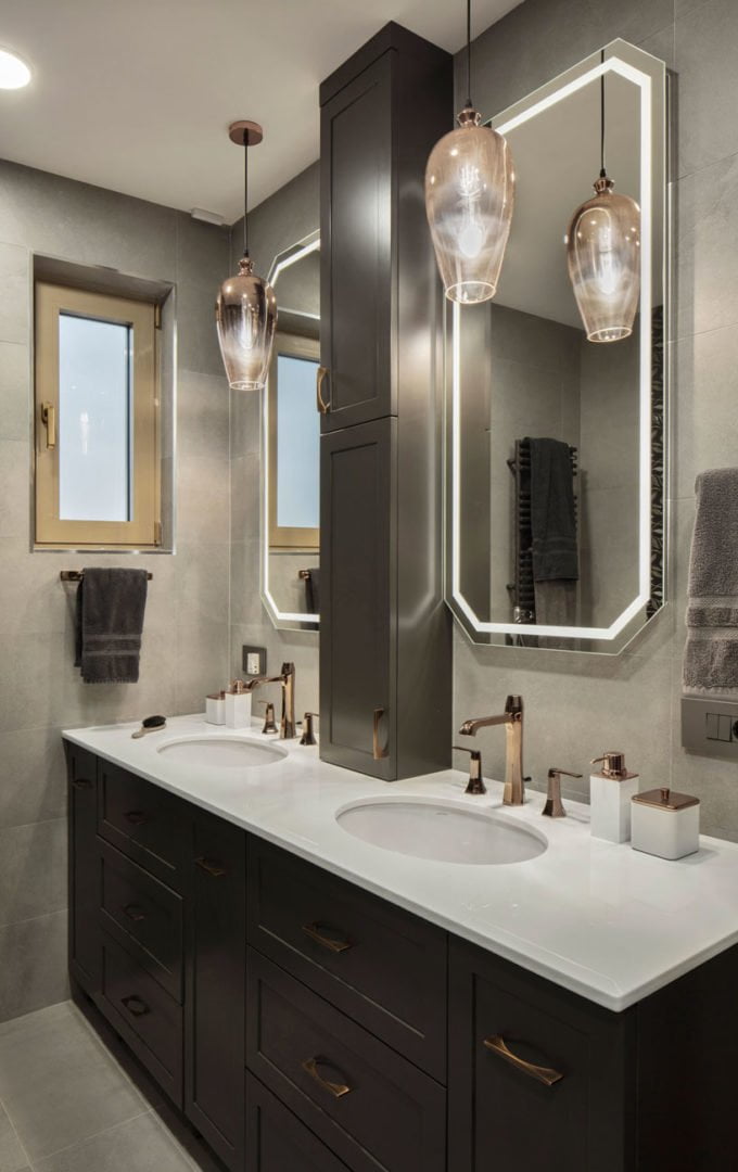 photo master bathroom in brown and beige tones with two washbasins and mirrors